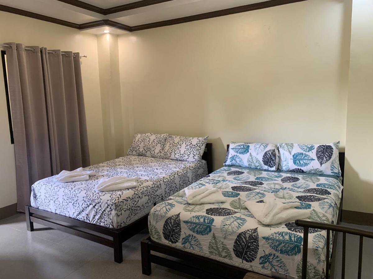 Zl Travelers Inn Batuan Екстер'єр фото