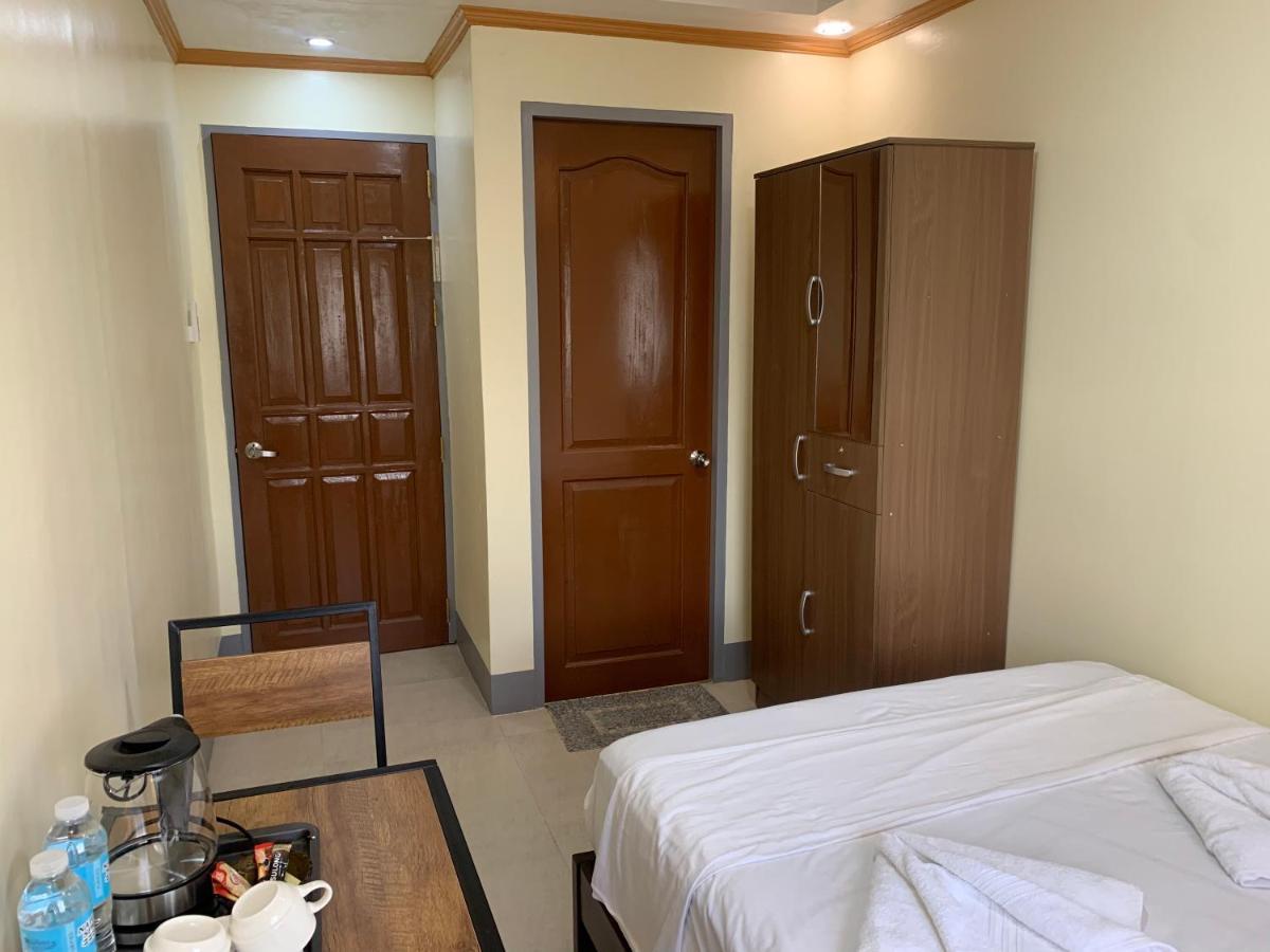 Zl Travelers Inn Batuan Екстер'єр фото