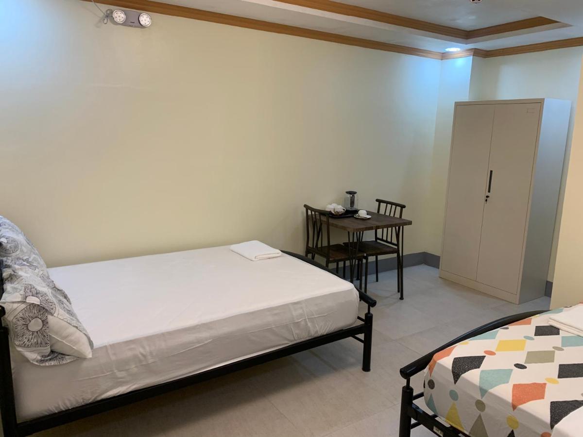 Zl Travelers Inn Batuan Екстер'єр фото