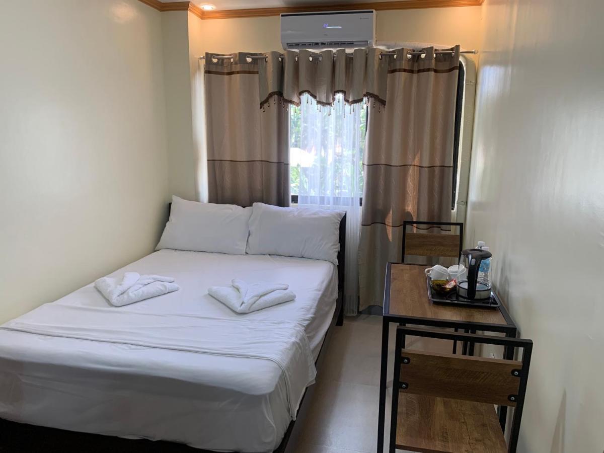 Zl Travelers Inn Batuan Екстер'єр фото