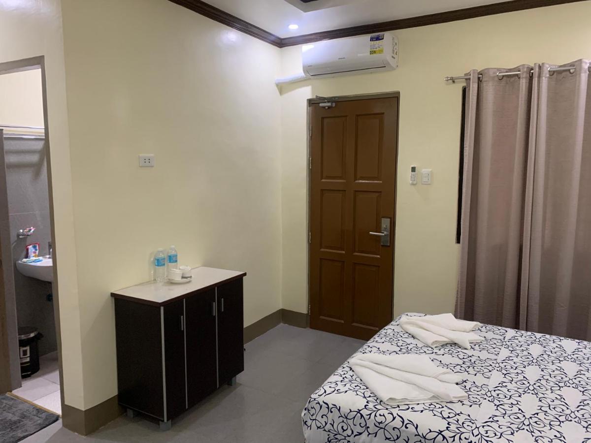 Zl Travelers Inn Batuan Екстер'єр фото