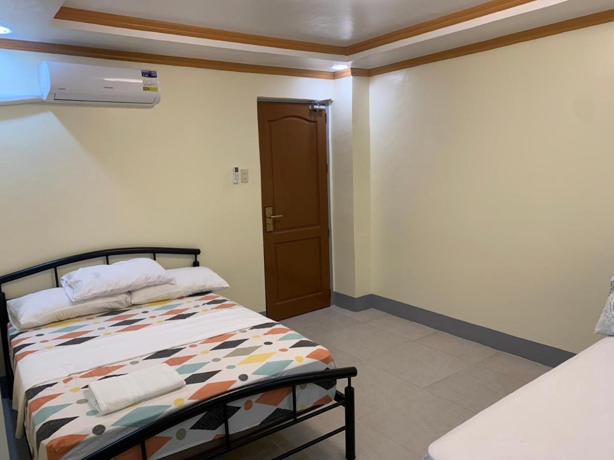 Zl Travelers Inn Batuan Екстер'єр фото
