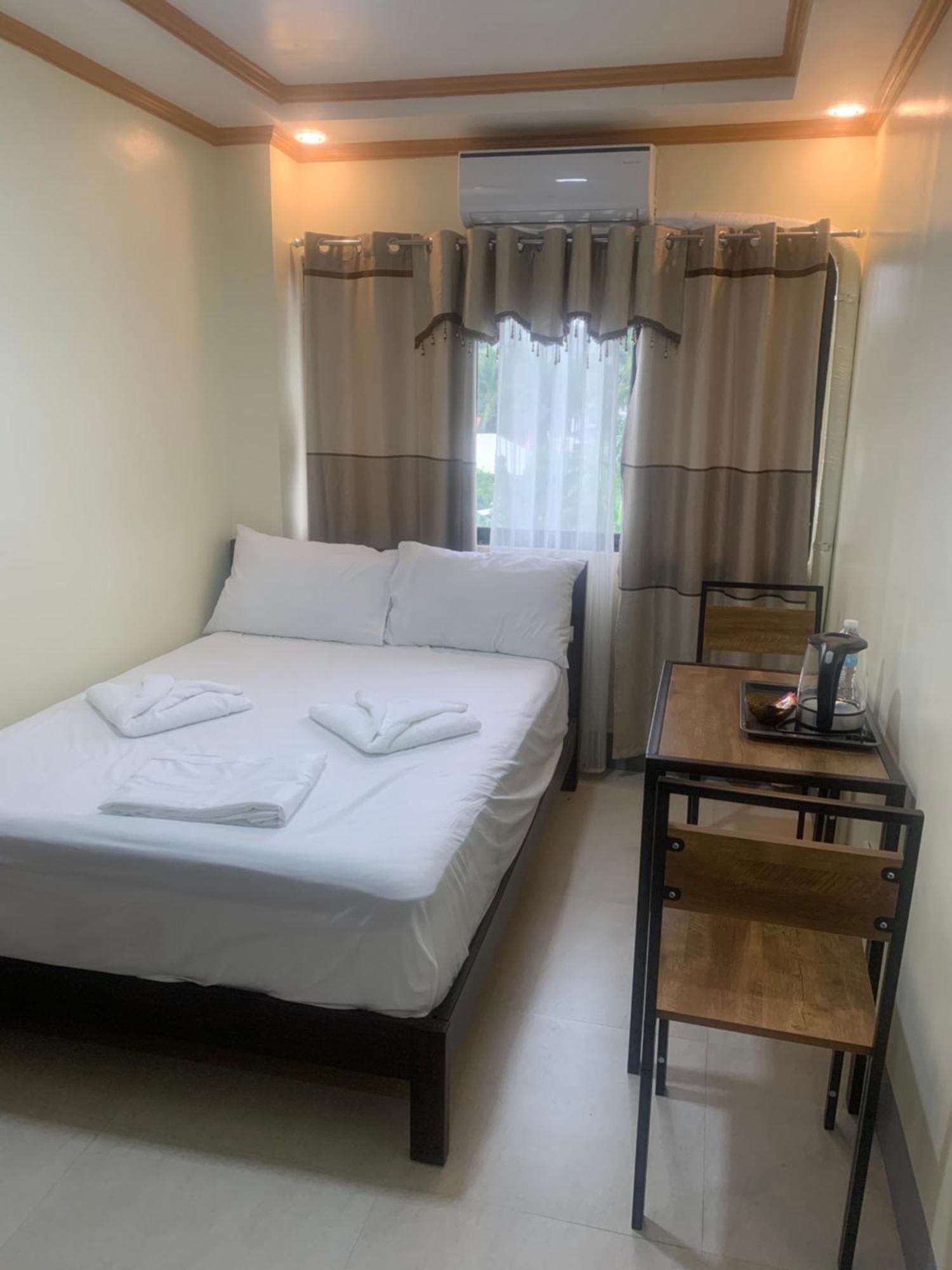 Zl Travelers Inn Batuan Екстер'єр фото