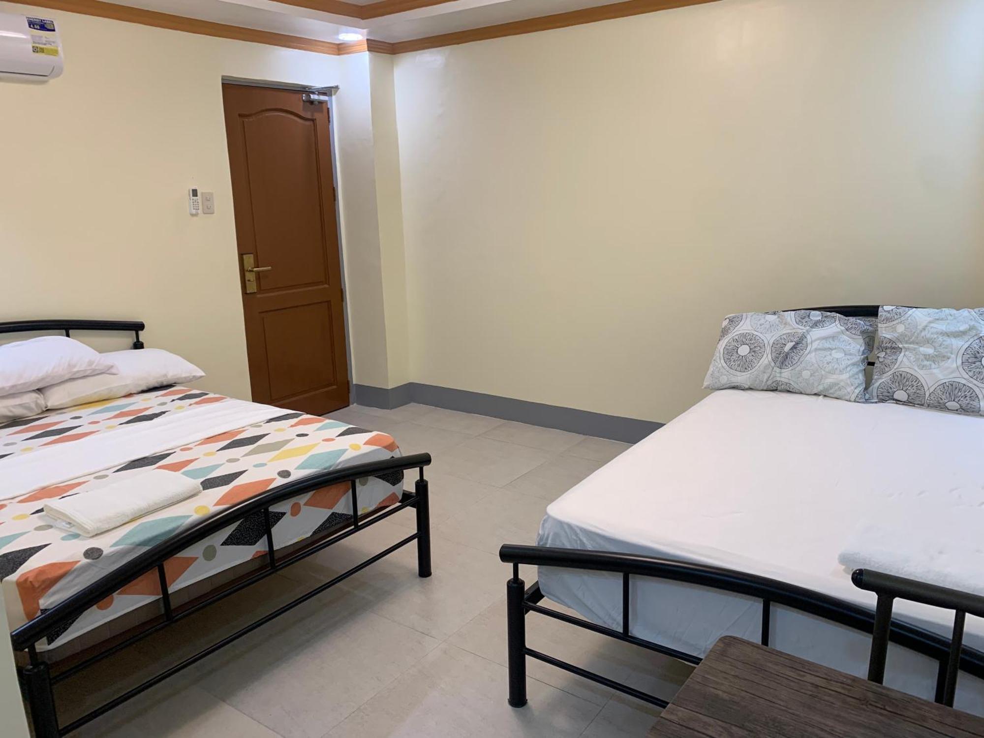 Zl Travelers Inn Batuan Екстер'єр фото